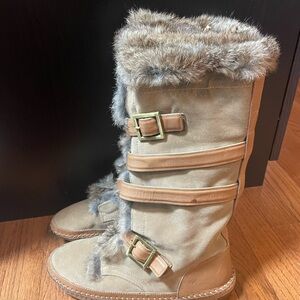 Tory Burch genuine shearling and fur lined suede boots.